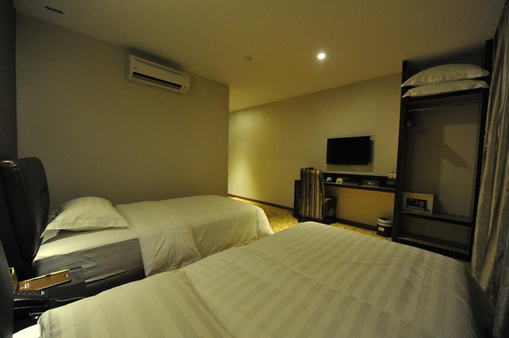 Milano Hotel Kluang Habitación foto